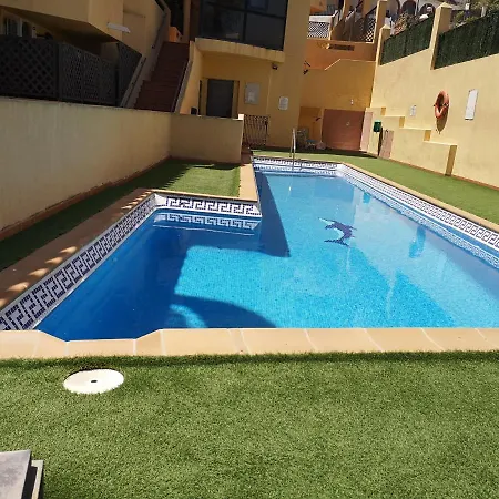 Auxi Y Emilio En Playamar توريمولينوس